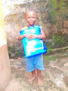 Morlai holding his net