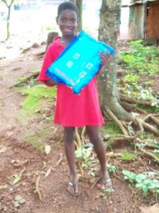 Sulaiman happily holding his new net