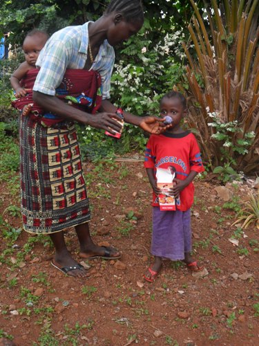 Hawanatu taking her vitamins!